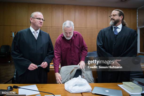 Daniel M. Arrives with his lawyers Hannes Linke and Robert Kain for his trial on charges of spying for the Swiss government on October 18, 2017 in...