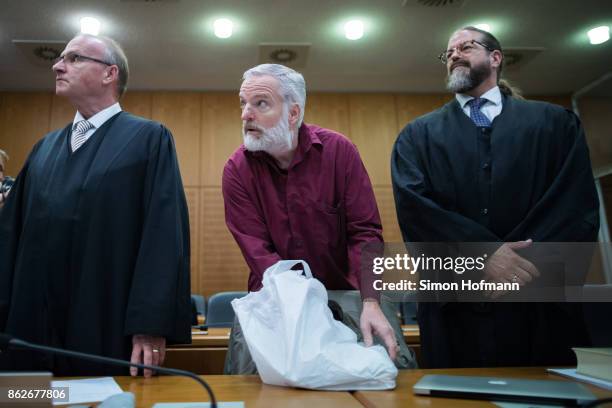 Daniel M. Arrives with his lawyers Hannes Linke and Robert Kain for his trial on charges of spying for the Swiss government on October 18, 2017 in...