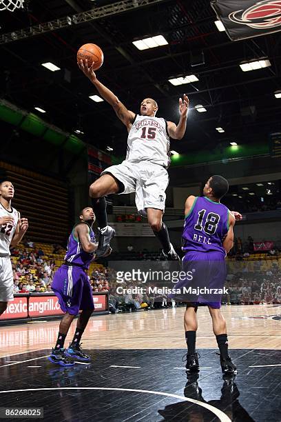 Giddens of the Utah Flash drives to the basket for a layup against David Bell of the Dakota Wizards during the second round of the D-League Playoffs...