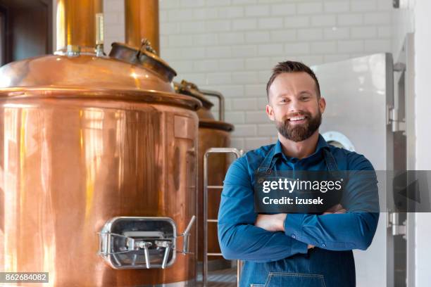 the master brewer in his micro brewery - brewers stock pictures, royalty-free photos & images