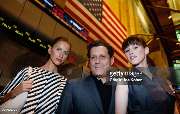 Designer Isaac Mizrahi poses for photo with models the NYSE Closing Bell ringing and a fashion show to celebrate Isaac Mizrahi's collection for Liz...