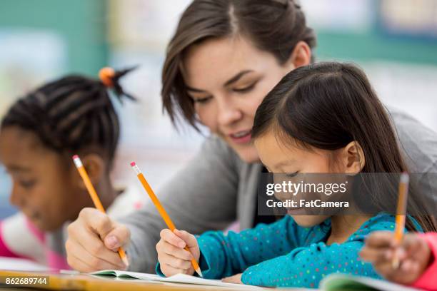 learning to spell - stories of the day stock pictures, royalty-free photos & images