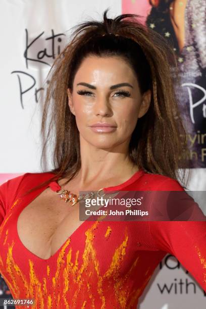 Katie Price poses at a photocall for her new novel 'Playing With Fire' at The Worx Studio's on October 17, 2017 in London, England.