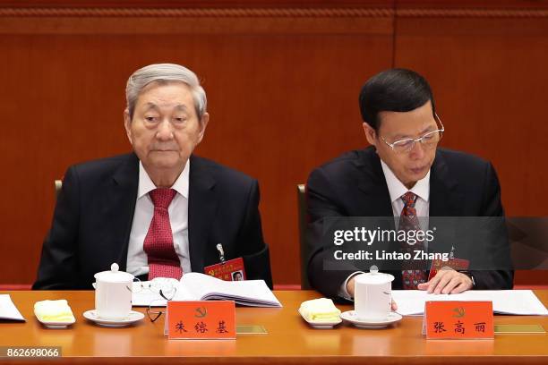 China's former Premier Zhu Rongji with Chinese Vice-Premier Zhang Gaoli attends opening session of the Chinese Communist Party's Congress at the...