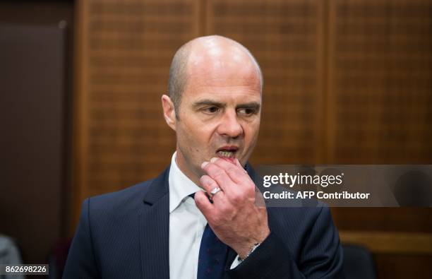Senior public prosecutor Lienhard Weiss arrives for the opening of a trial against defendant Daniel M at court in Frankfurt am Main, western Germany,...