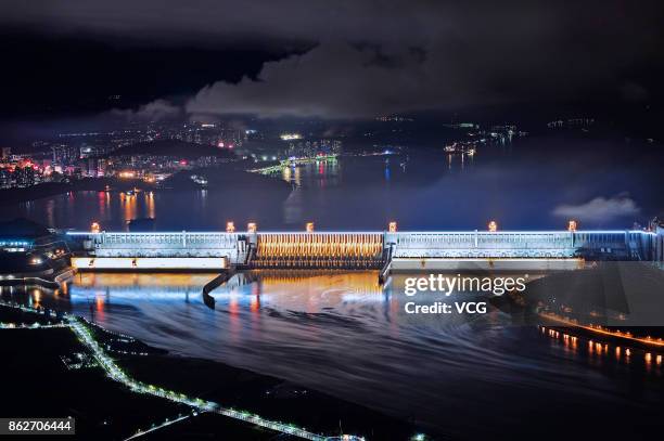 A night view of the illuminated Three Gorges Dam on October 17, 2017 ...
