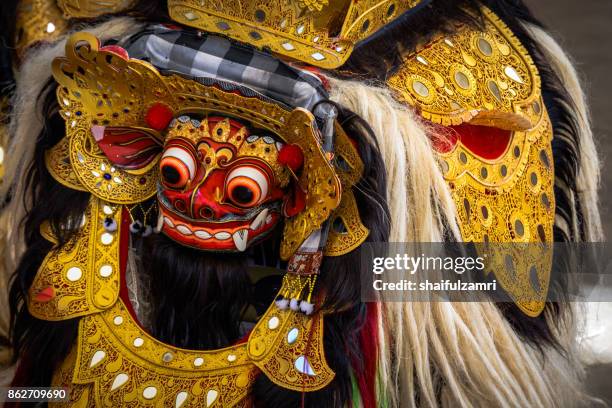 barong dance mask of lion in ubud, bali, indonesia. barong dance is the most popular dance for tourists. - barong dance stock pictures, royalty-free photos & images