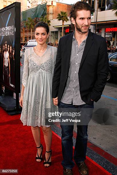 Actress Amanda Peet and David Benioff arrive on the red carpet of the Los Angeles industry screening of "X-Men Origins: Wolverine" at the Grauman's...