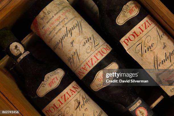 July 23: Bottles of Poliziano's Sangiovese grape Vino Nobile di Montepulciano, dated to 1970 and 1971, are stored in its cellars on July 23, 2015 in...