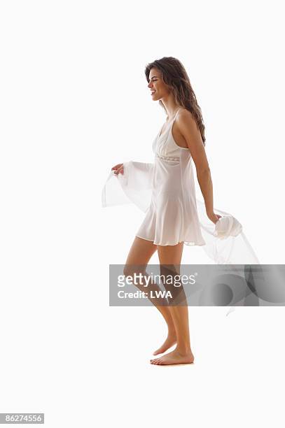 woman wearing negligee - negligée stock-fotos und bilder