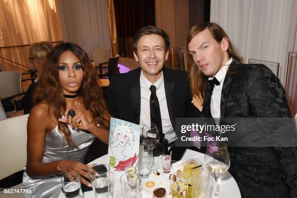 Mia Frye, Thierry Marsaux and his husband Christophe Guillarme attend the 'Gala de L'Espoir' Auction Dinner Against Cancer at the Theatre des Champs...