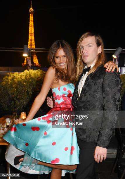 Presenter Karine Arsene and designer Christophe Guillarme attend the 'Gala de L'Espoir' Auction Dinner Against Cancer at the Theatre des Champs...