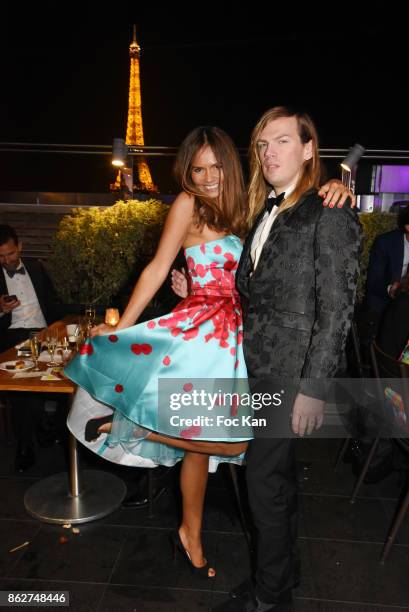 Presenter Karine Arsene and designer Christophe Guillarme attend the 'Gala de L'Espoir' Auction Dinner Against Cancer at the Theatre des Champs...