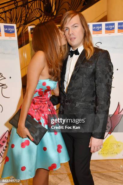 Presenter Karine Arsene and designer Christophe Guillarme attend the 'Gala de L'Espoir' Auction Dinner Against Cancer at the Theatre des Champs...