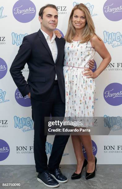 Designer Ion Fiz and Carla Goyanes attend the 'Nancy se viste de novia' event at Hat Bar on October 18, 2017 in Madrid, Spain.