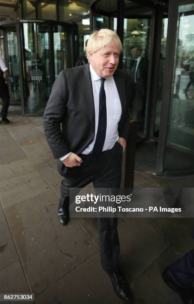 Foreign Secretary Boris Johnson leaves Portcullis House, London.