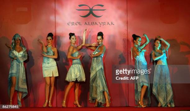 Models display outfits by a Turkish designer during a fashion show at the 'Regional Countries General Trade Fair' in the northern city of Arbil, 350...