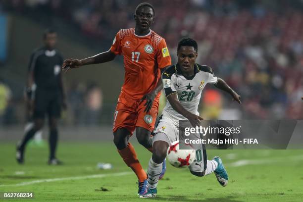 Ibrahim Boubacar of Niger and Isaac Gyamfi of Ghana battle for the ball during the FIFA U-17 World Cup India 2017 Round of 16 match between Ghana v...