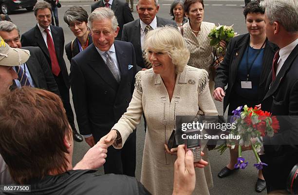 Prince Charles, Prince of Wales, and Camilla, Duchess of Cornwall, greet members of the public outside the British Embassy on April 29, 2009 in...