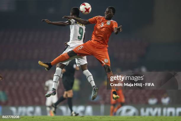 Richard Danso of Ghana and Farouk Idrissa of Niger battle for the ball during the FIFA U-17 World Cup India 2017 Round of 16 match between Ghana v...