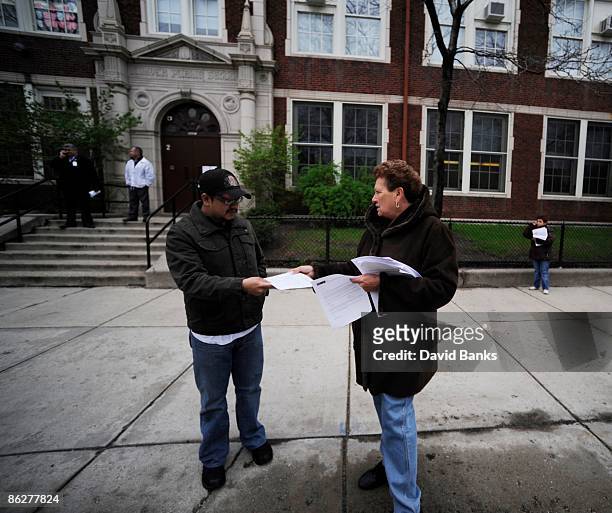 Parent receives information about Swine Flu at Kilmer Elementary School April 29, 2009 in Chicago, Illinois. There has been a confirmed case of the...