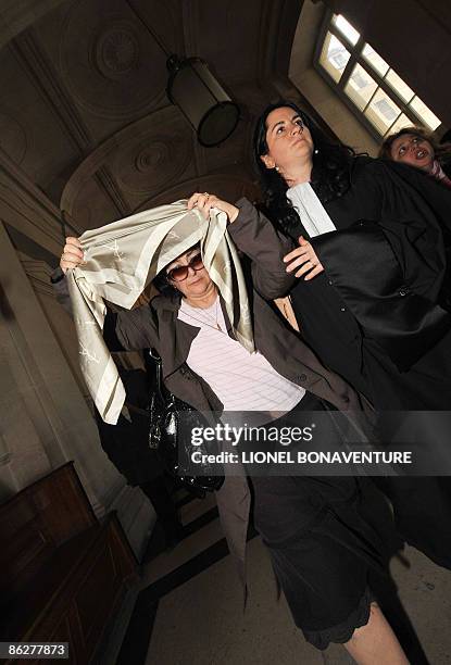 The mother of Ilan Halimi leaves the audience room flanked by her lawyer Caroline Toby on April 29, 2009 at Paris courthouse, during a break of the...