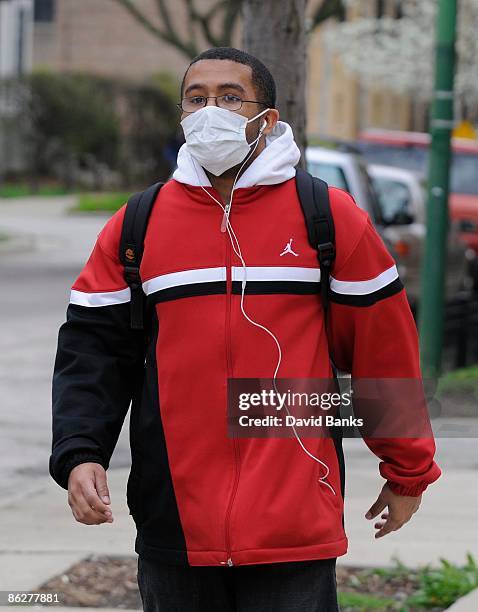 Boy walks past Kilmer Elementary School April 29, 2009 in Chicago, Illinois. There has been a confirmed case of the flu at the school which will be...