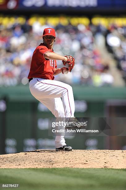 Wilson of the Texas Rangers pitches during the game against the Cleveland Indians at Rangers Ballpark in Arlington in Arlington, Texas on Monday,...