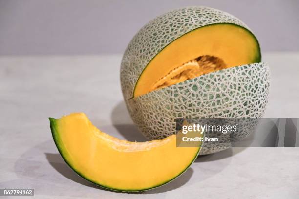 fresh, juicy cantaloupe melon with slices - muskmelon stock pictures, royalty-free photos & images