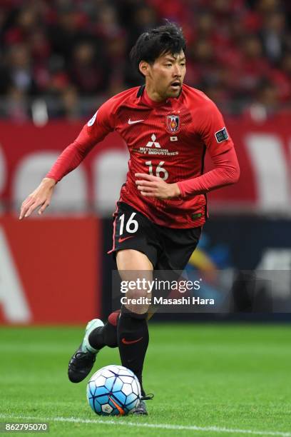 Takuya Aoki of Urawa Red Diamonds in action during the AFC Champions League semi final second leg match between Urawa Red Diamonds and Shanghai SIPG...