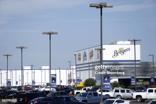 Vehicles sit parked outside of the Unilever Plc ice cream plant facility in Covington, Tennessee, U.S., on Tuesday, Oct. 3, 2017. Unilever is...