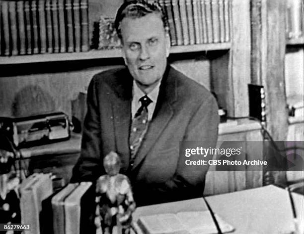 Screen capture shows American Evangelical Christian Billy Graham during an interview on an episode of the television program 'Person to Person,'...