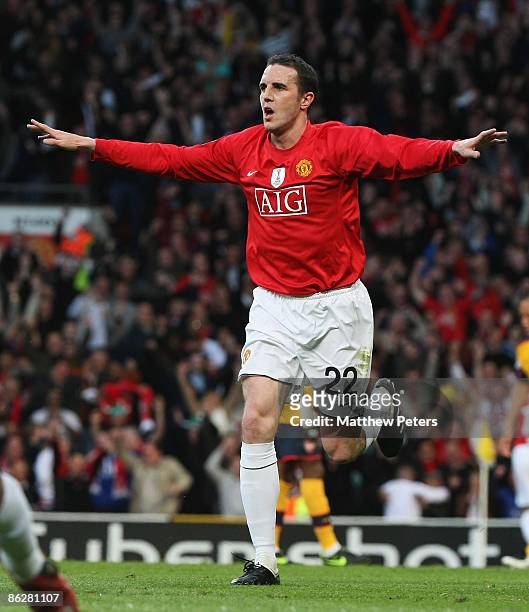 John O'Shea of Manchester United celebrates scoring their first goal during the UEFA Champions League Semi-Final first leg match between Manchester...