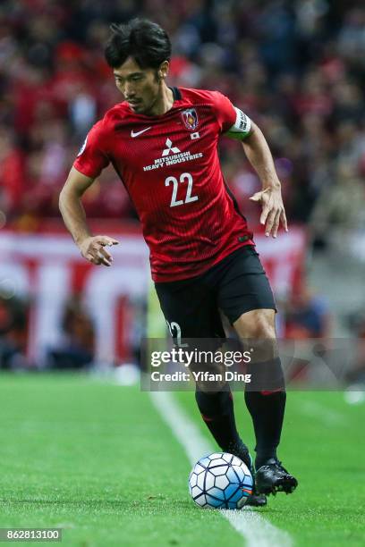 Abe Yuki of Shanghai SIPG in action during the AFC Champions League semi final second leg match between Urawa Red Diamonds and Shanghai SIPG at...