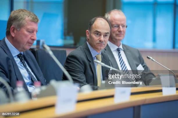 Warren East, chief executive officer of Rolls Royce Holdings Plc, center, looks on during the European Union Aeronautics Conference inside the...