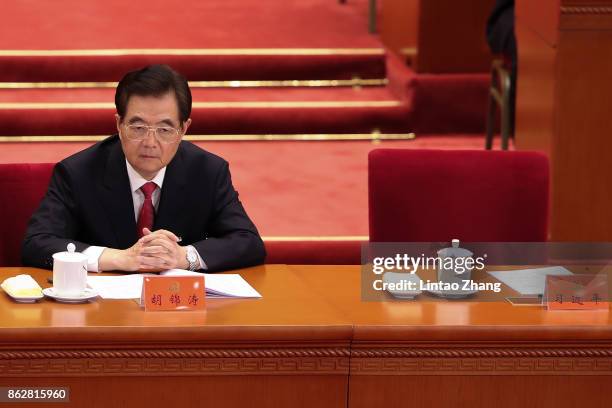 Hu Jintao, China's former president attend the opening session of the Chinese Communist Party's Congress at the Great Hall of the People on October...