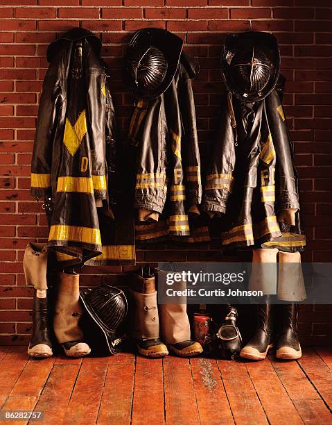 firefighting protective gear - firefighter boot stock pictures, royalty-free photos & images