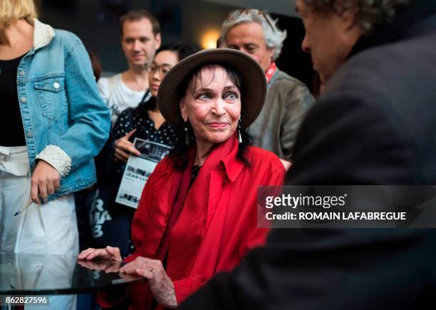 French actress Anna Karina reacts as she speaks with fans after addressing a master class on October 18, 2017 in Lyon, central-eastern France, during...
