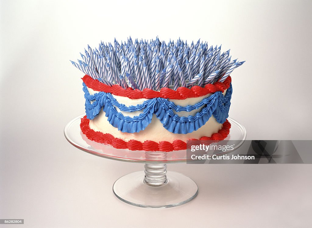 Three hundred candles on patriotic cake