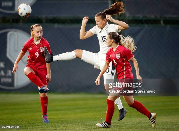 Tanja Pawollek of Germany in action against Andrijana Trisic and Miljana Ivanovic of Serbia during the international friendly match between U19...