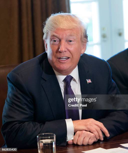 President Donald Trump speaks during a meeting with members of the Senate Finance Committee and his economic team October 18, 2017 at the White House...