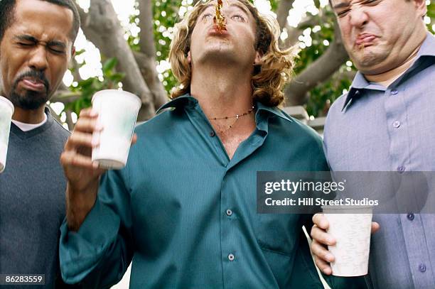 Spitting Rude Spitting Drink Photos and Premium High Res Pictures - Getty Images