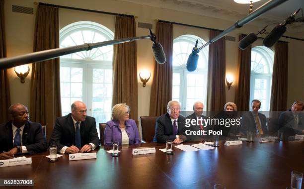 President Donald Trump speaks during a meeting with members of the Senate Finance Committee and his economic team October 18, 2017 at the White House...