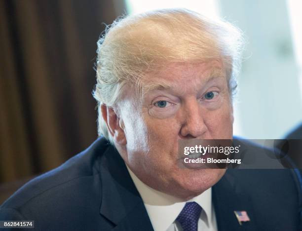 President Donald Trump speaks during a meeting with members of the Senate Finance Committee in the Cabinet Room of the White House in Washington,...