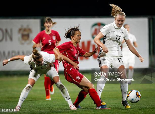 Sandra Malesevic of Serbia is challenged by Annalena Rieke and Giulia Gwinn of Germany during the international friendly match between U19 Women's...