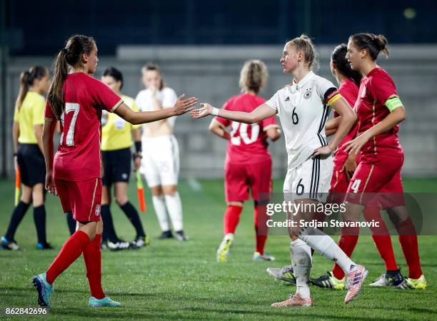 Nikolina Plavsic of Serbia shake hands with the Giulia Gwinn of Germany after the international friendly match between U19 Women's Serbia and U19...