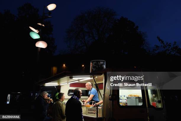 Fans enjoy some pre match food prior to the UEFA Champions League group B match between RSC Anderlecht and Paris Saint-Germain at Constant Vanden...