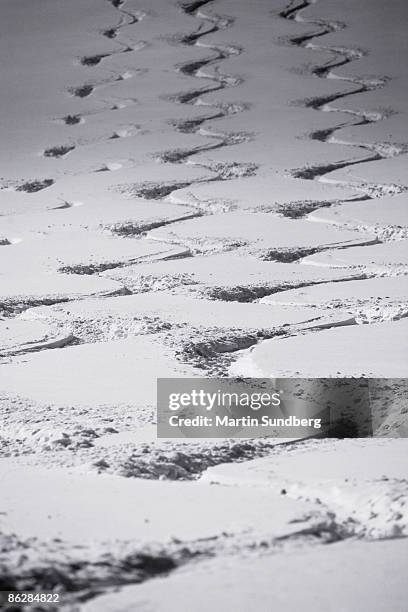 tire tracks in the snow - swerve stock pictures, royalty-free photos & images