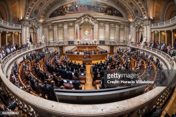 Portuguese Prime Minister Antonio Costa and his cabinet of ministers observes a moment of silence with members of Parliament in honor of the victims...