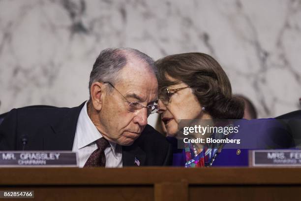 Senator Chuck Grassley, a Republican from Iowa and chairman of the Senate Judiciary Committee, left, speaks with ranking member Senator Dianne...